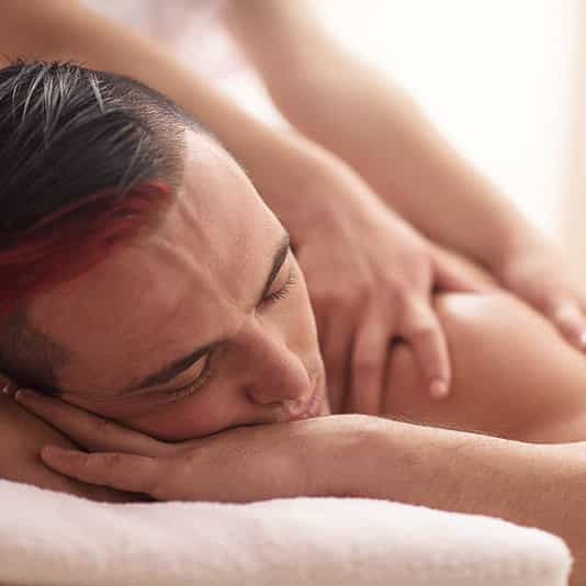 young man having a back massage